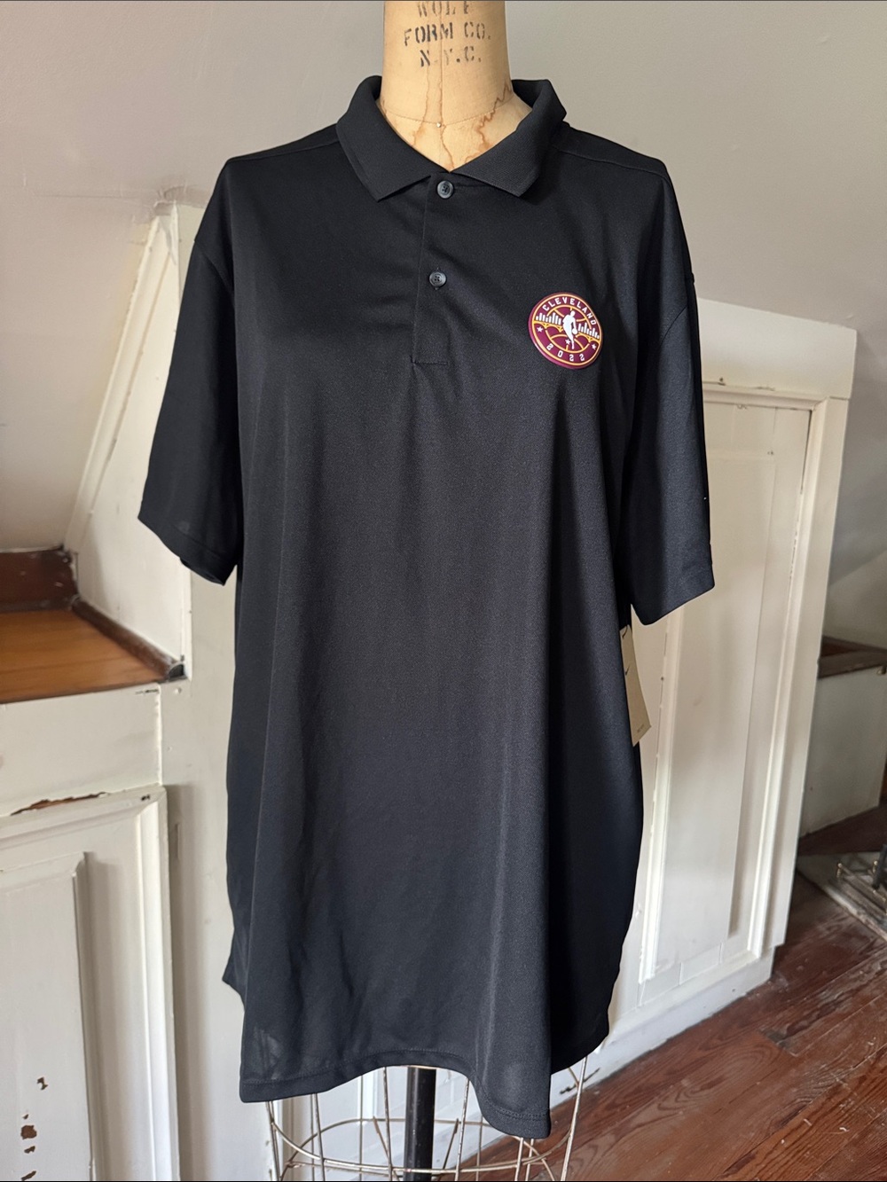 Nike Black Polo with Maroon and Gold Embroidered Chest Patch